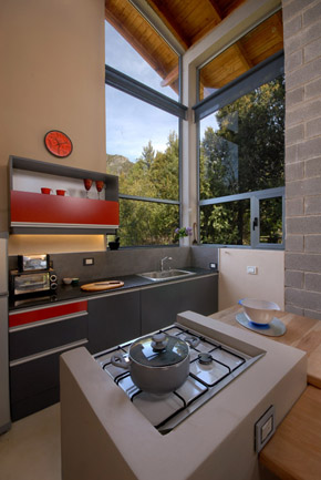 Full Kitchen: Refrigerator with freezer, toaster, oven, toaster oven, microwave, coffee maker, dishes, pots, etc.