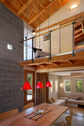 Double height ceiling and internal balcony to the kitchen and dining room